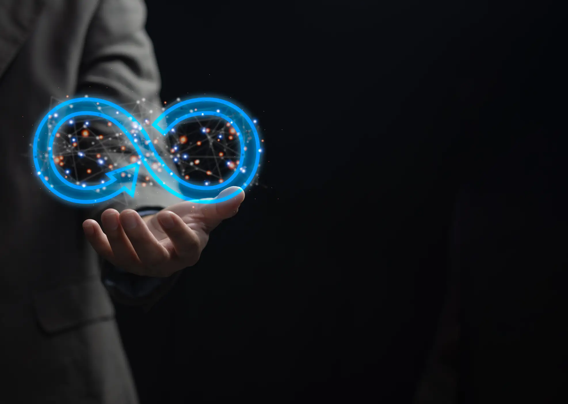 A glowing DevSecOps infinity loop held above an open hand